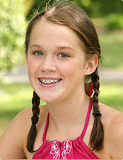 smiling girl with braces